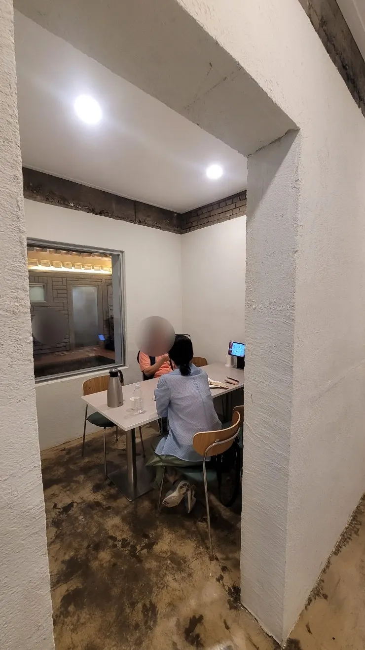 Modern seating in the main hall of Midam Kitchen