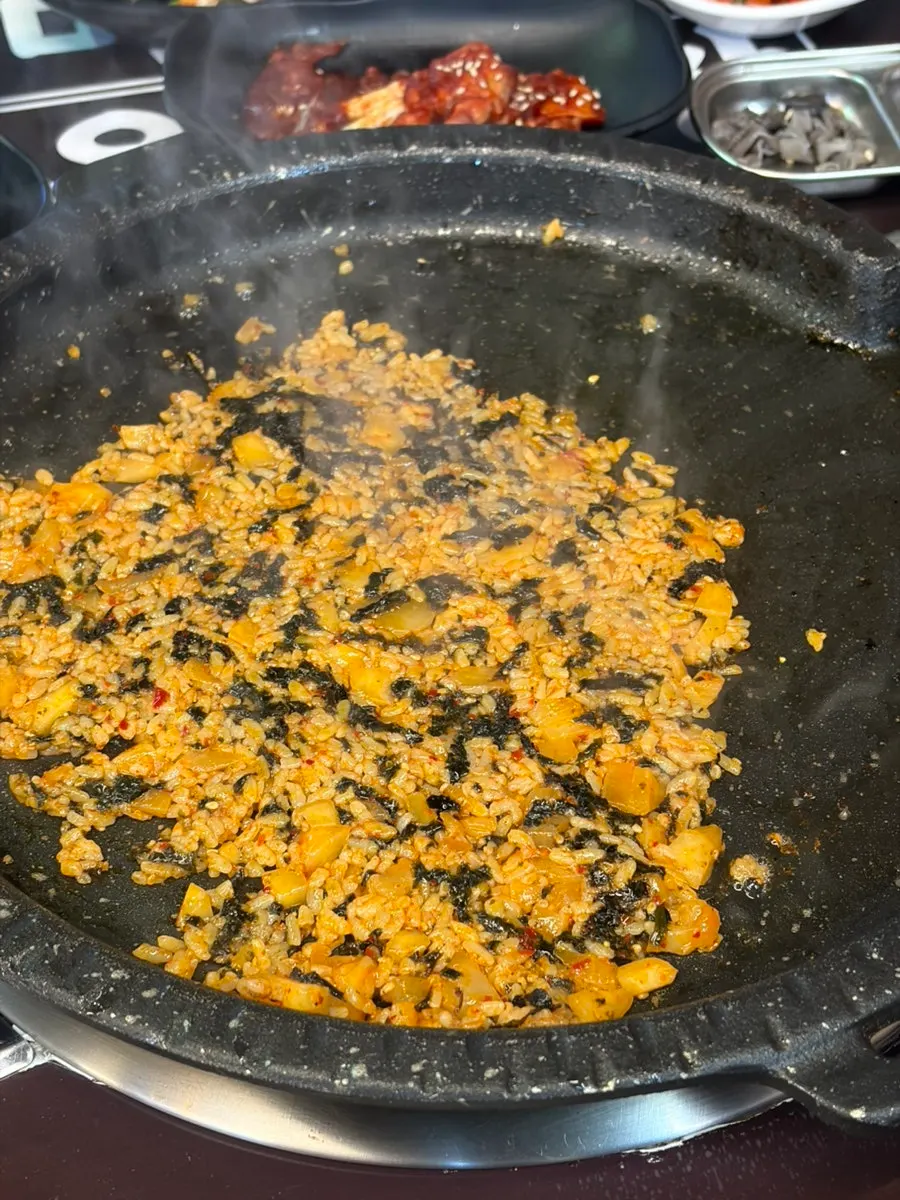 Fried rice cooked fresh on the griddle with marinated crab