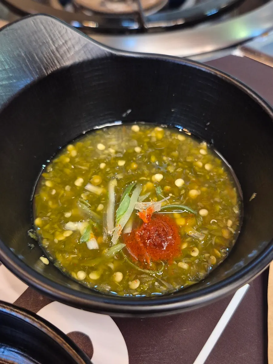 Beef liver and dipping sauce served as a starter