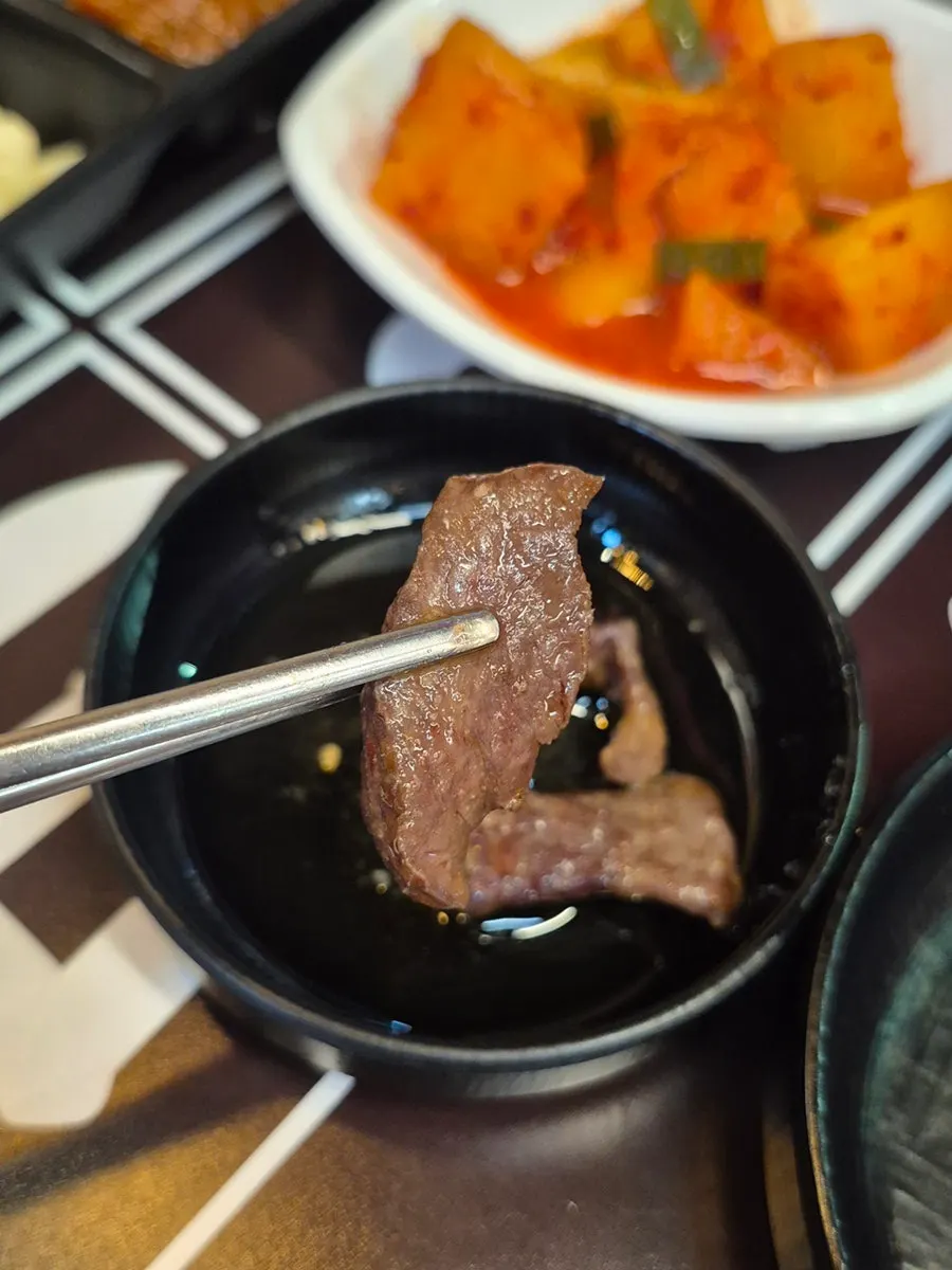 Grill piled high with gopchang, daechang, makchang, and heart