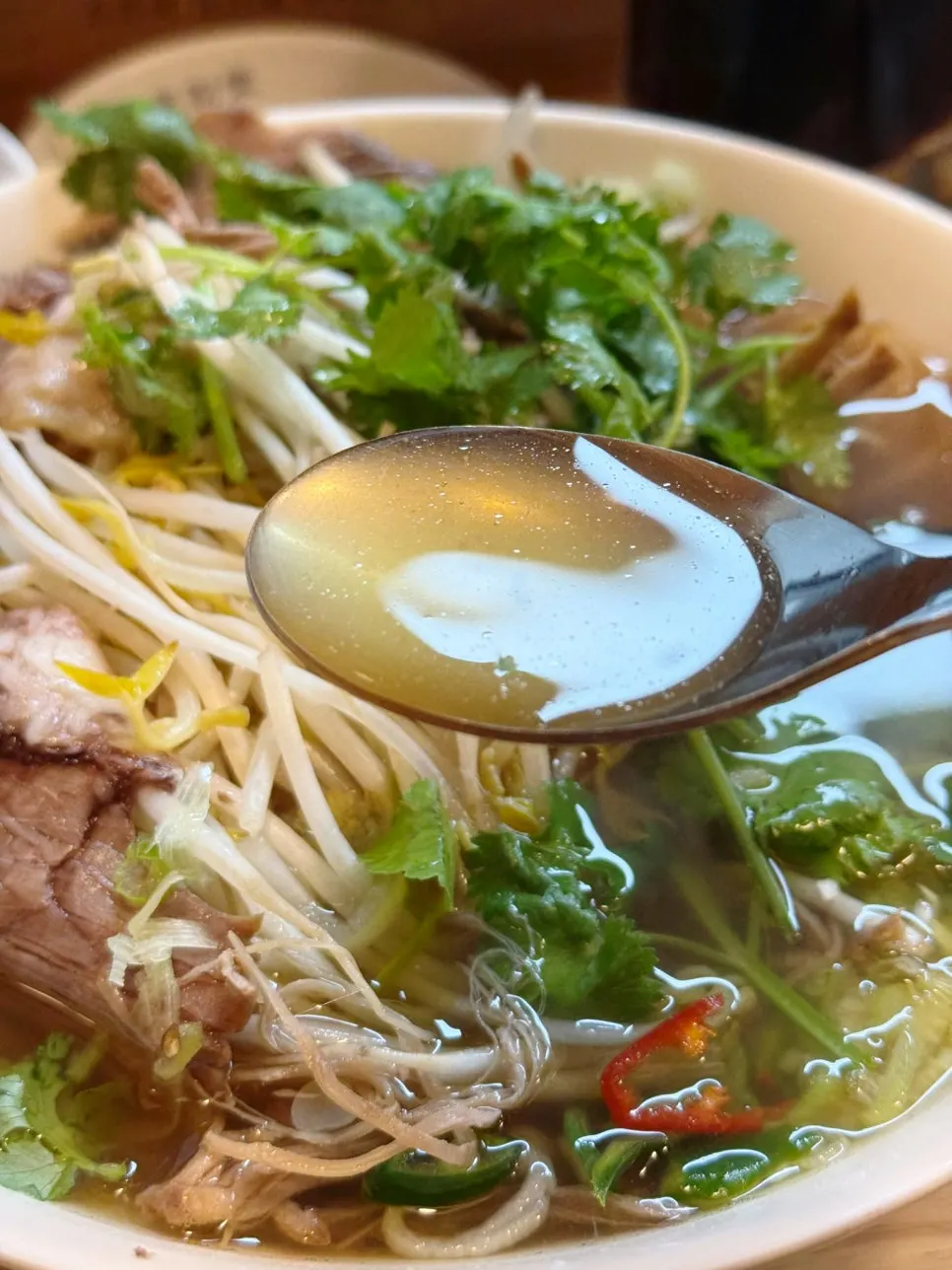 A bowl of Mibundang's rich pho broth