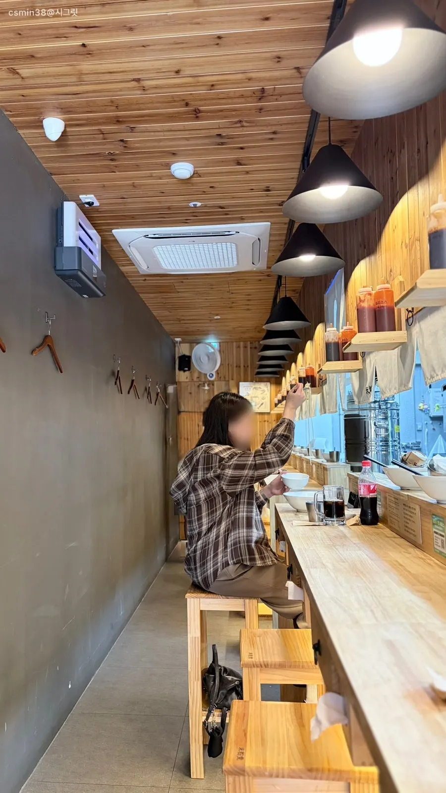 Bar seats arranged for solo diners
