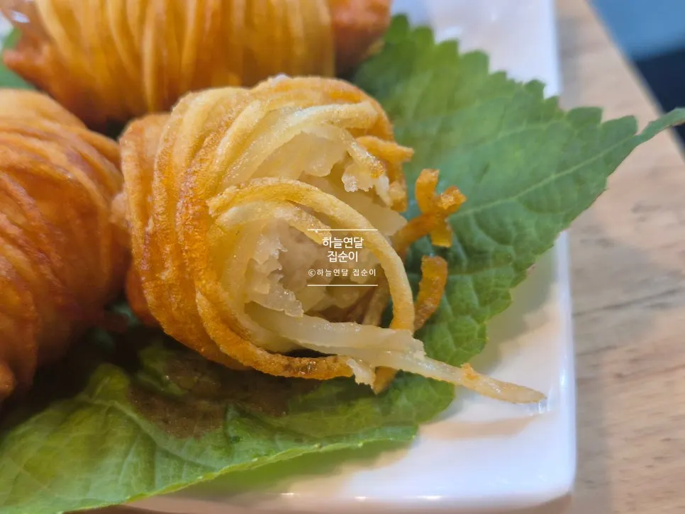 Table set with fried shrimp-potato rolls and brisket-flank pho