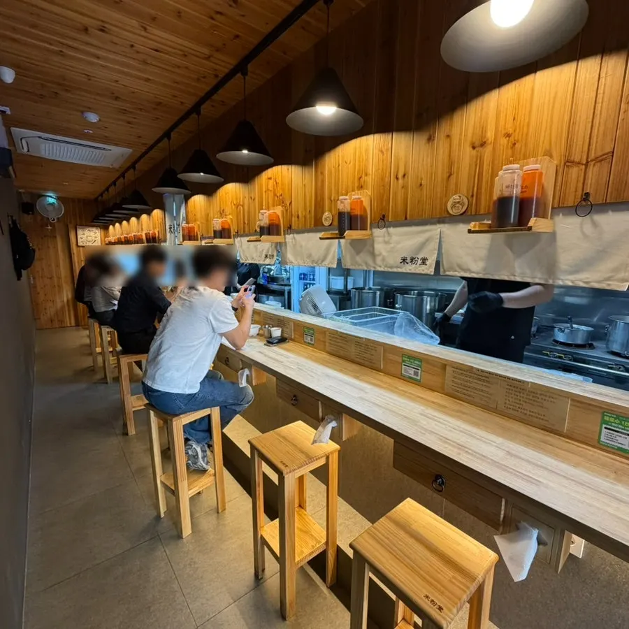 Open kitchen visible from the seating at Mibundang Dongtan Station