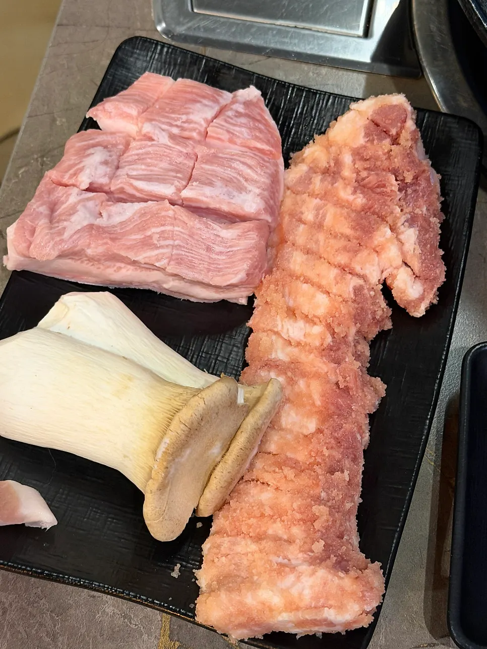 Raw aged pollack roe pork belly and pork jowl for the Pork Set for Two