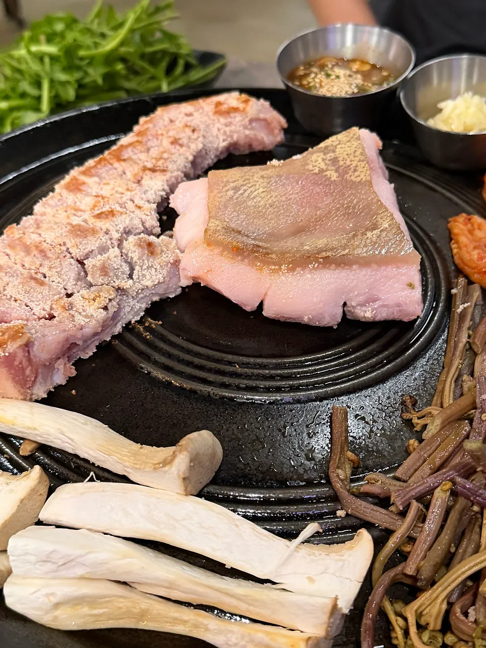 Aged pollack roe pork belly grilling with minari on top