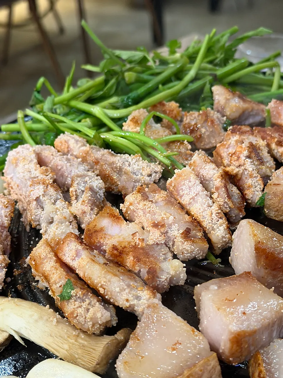 Close-up of aged pork belly topped with low-sodium pollack roe