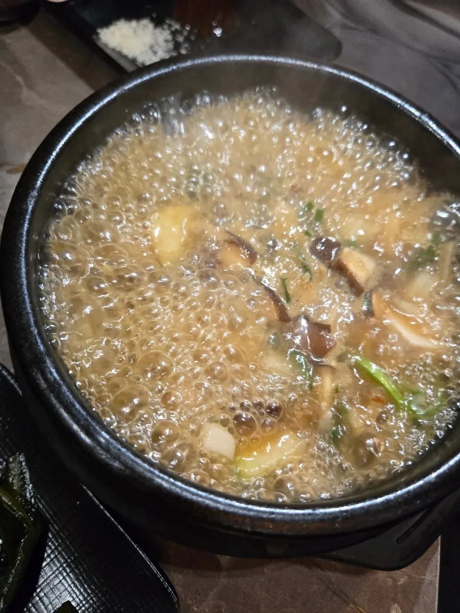 A bowl of meat-loaded doenjang jjigae at Midonjip