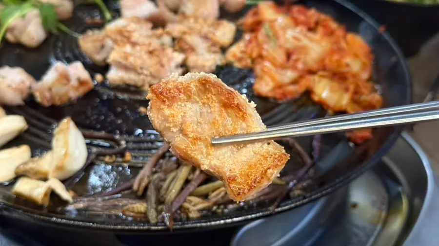 A crispy grilled piece of pollack roe pork belly