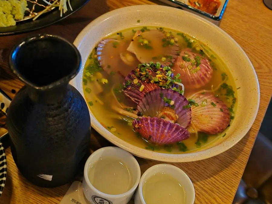 Complimentary sake-steamed scallops