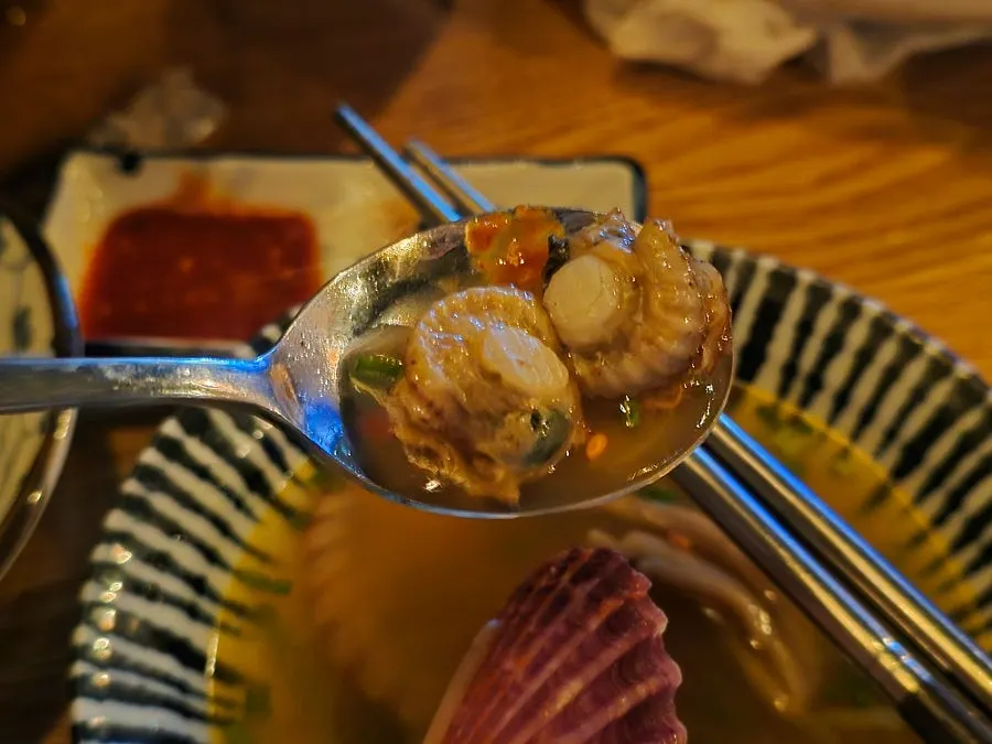 Midoriya's table with sashimi and sake