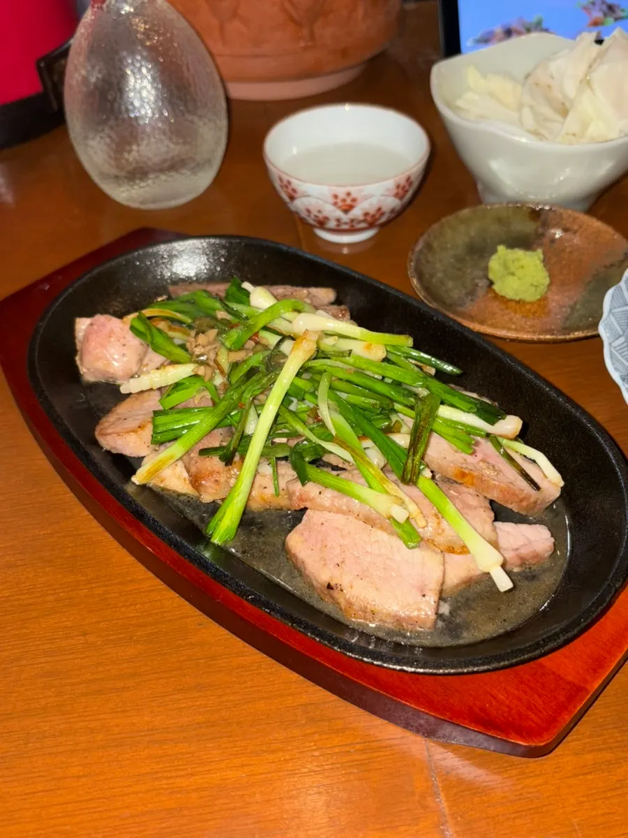 Aged tuna sashimi served with sesame sauce