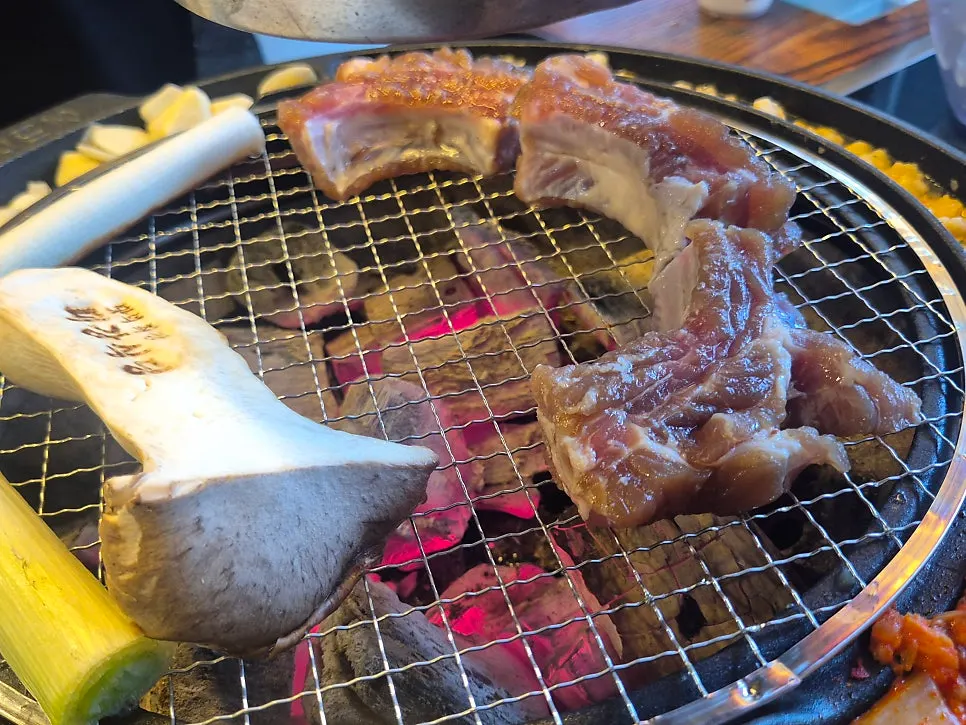 Grill with meat and sides cooking together