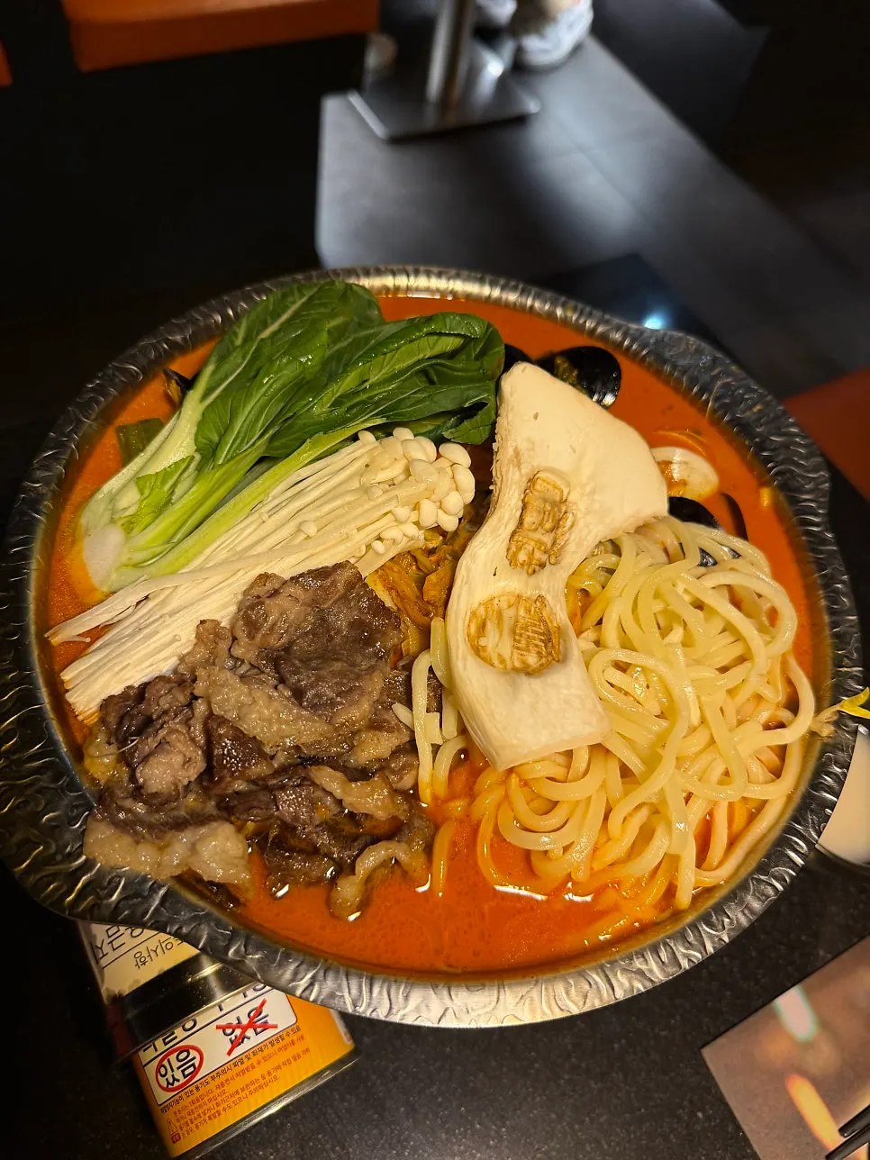 Wolmae makgeolli with a Korean bar snack spread