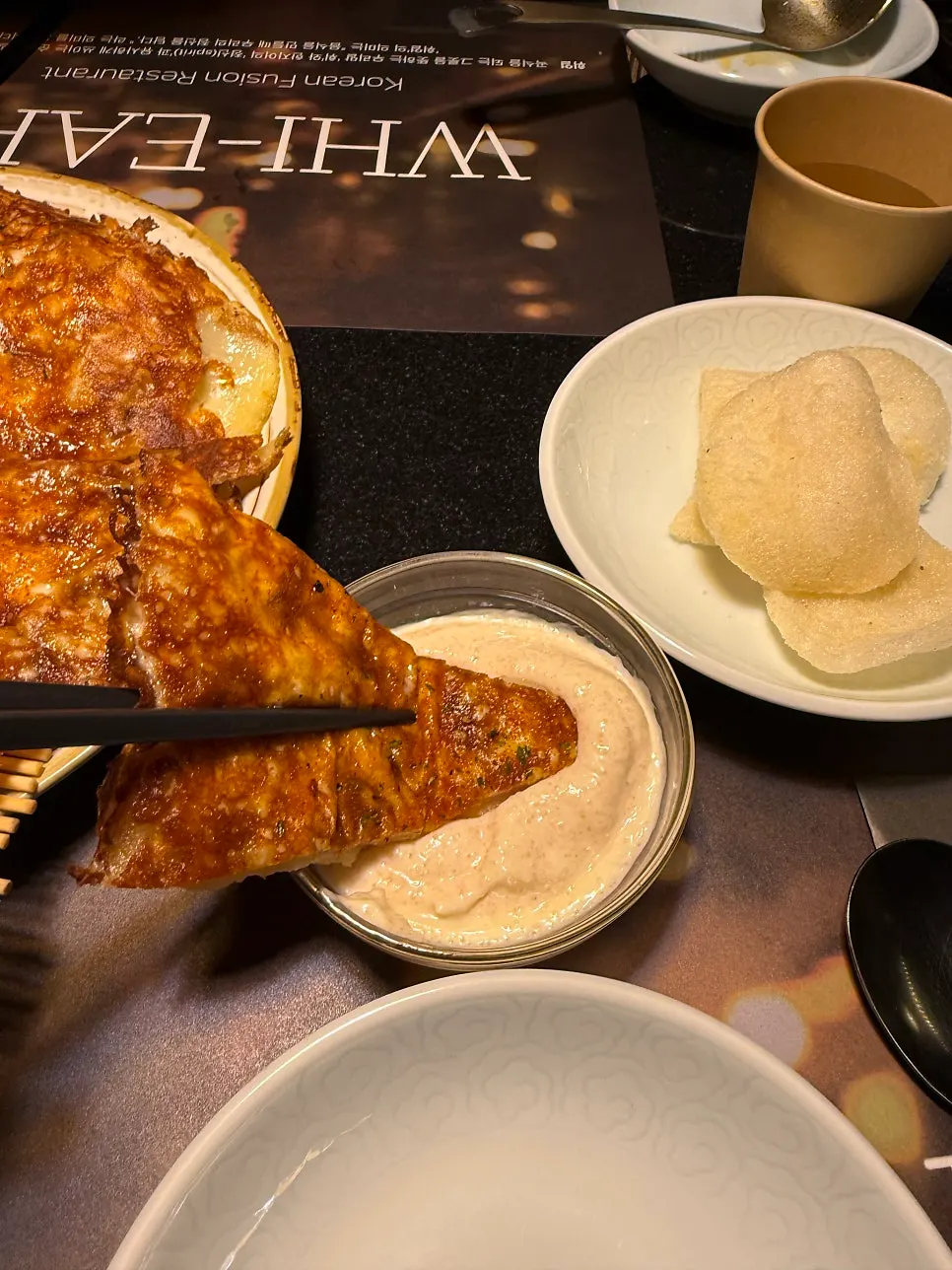 Potato pancake with pollock roe and cheese