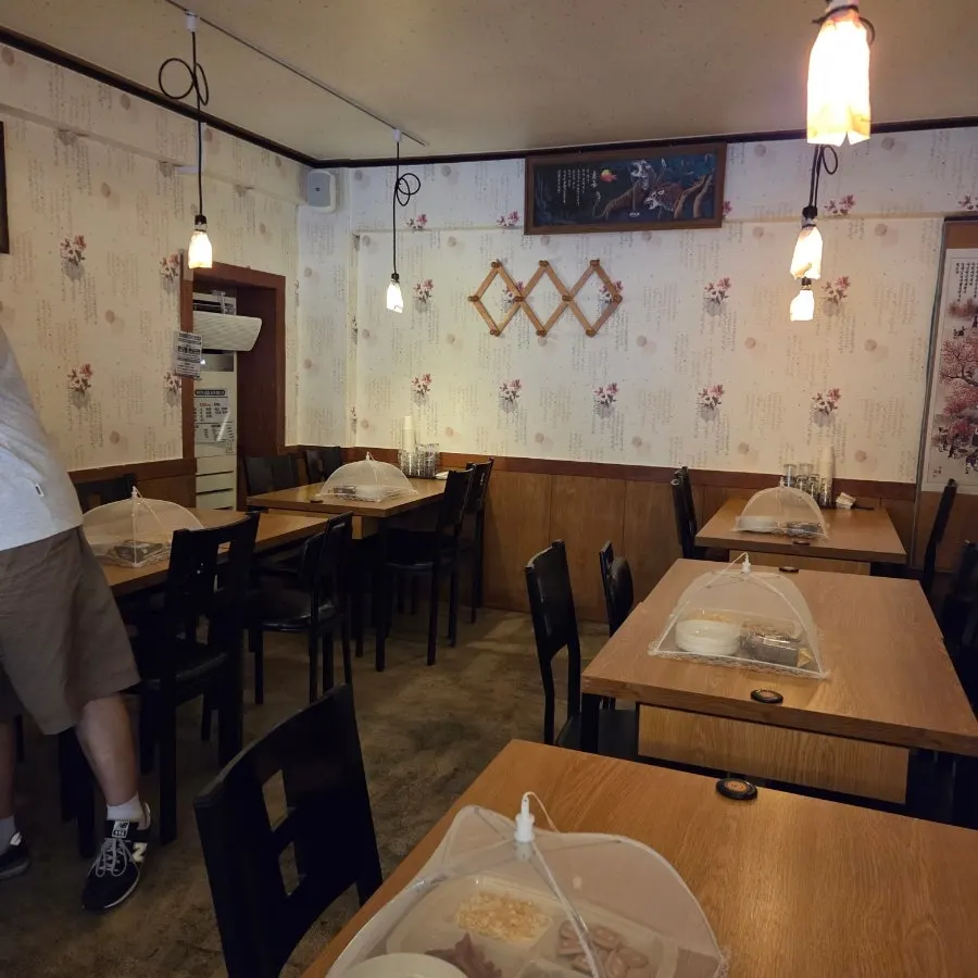 Counter with a phone charger and disposable aprons