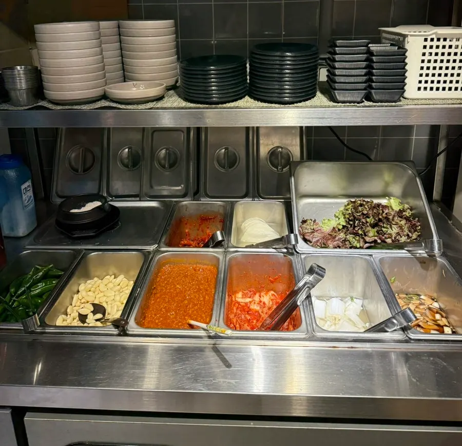 Self-serve bar with lettuce wraps and sauces