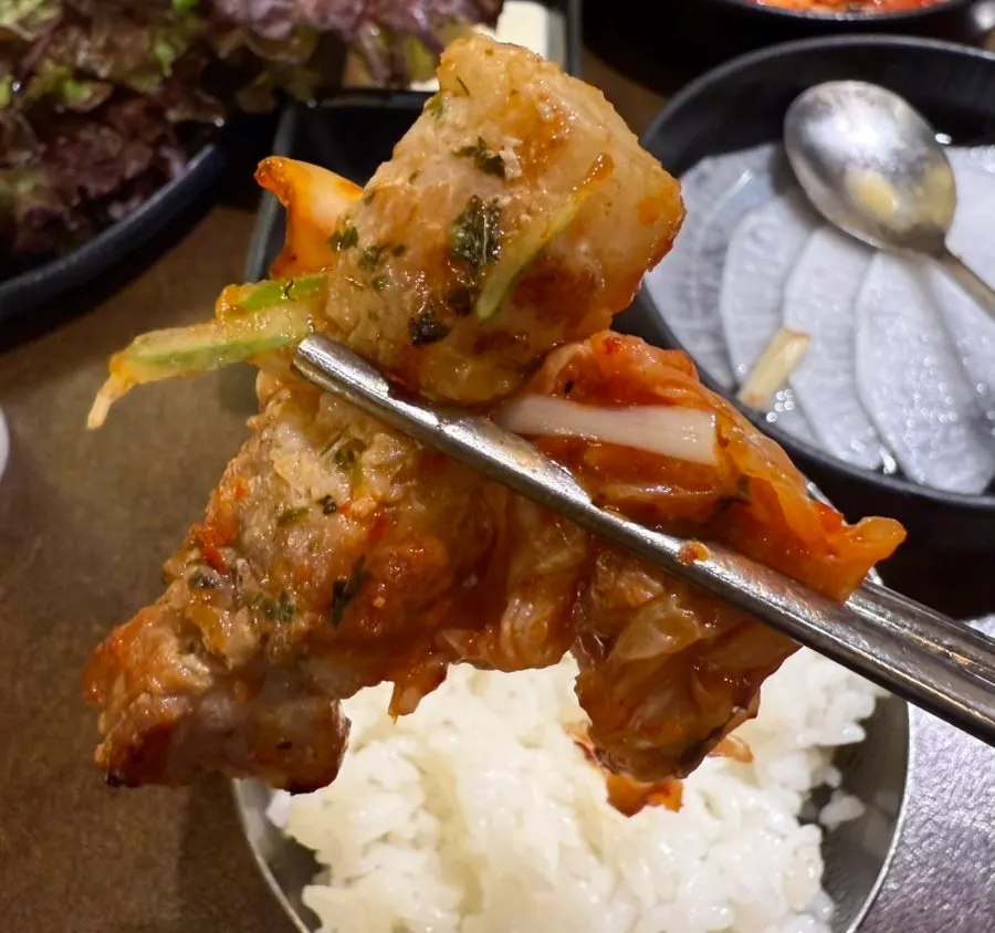 Close-up of golden-grilled pork belly