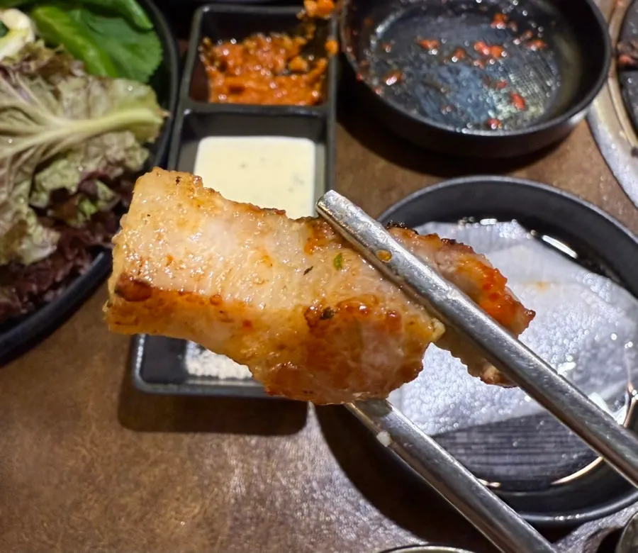 A full spread of meat with all the side dishes