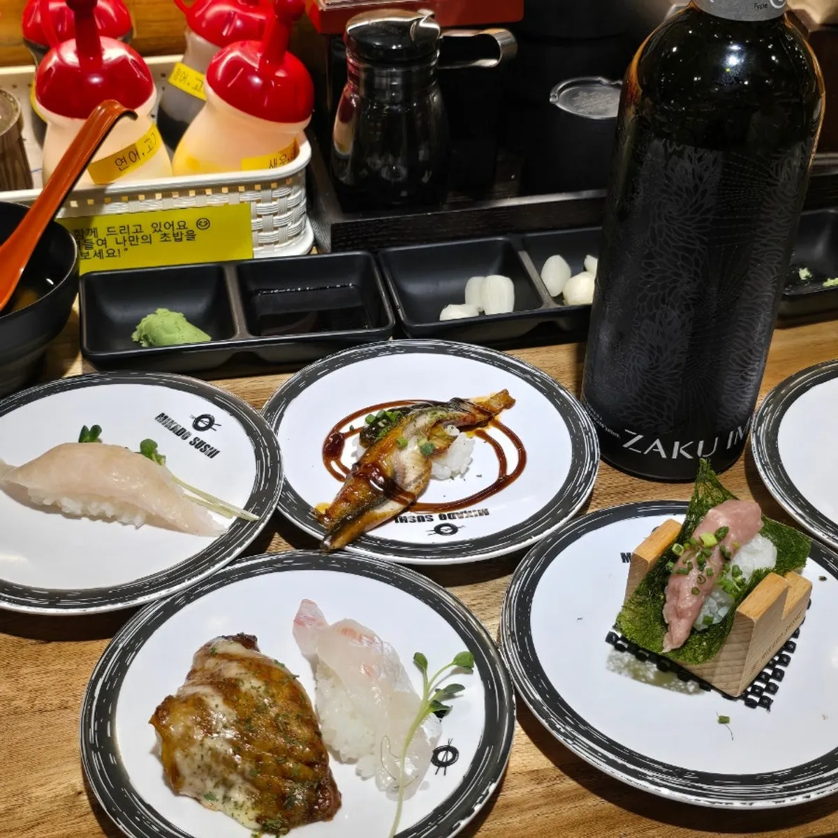 Plate with an assortment of different sushi types