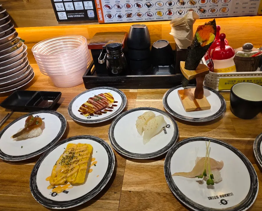 Table filled with various sushi types