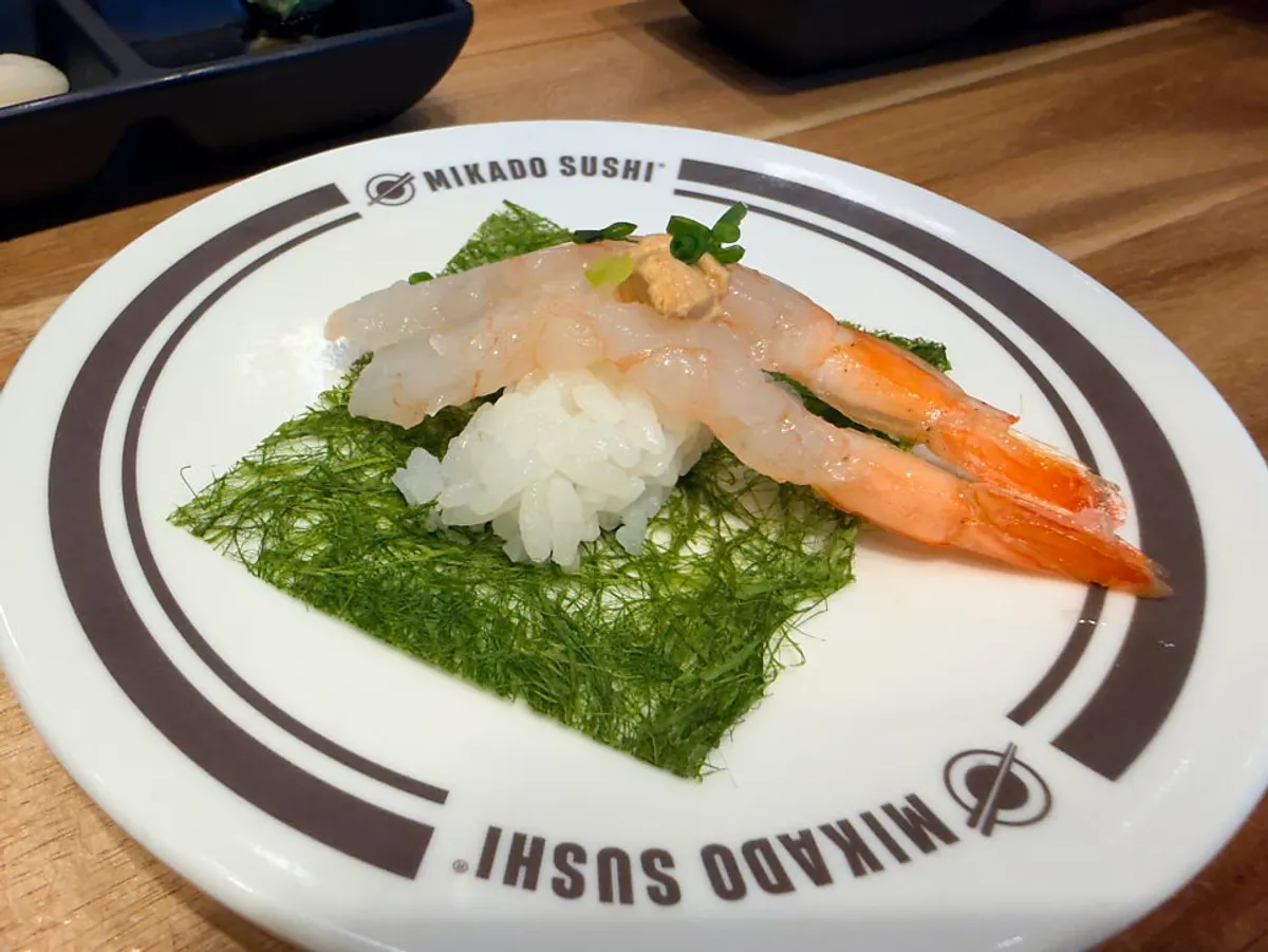 A plate of sweet shrimp ankimo sushi