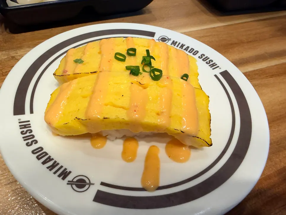 A plate of egg mayo sushi