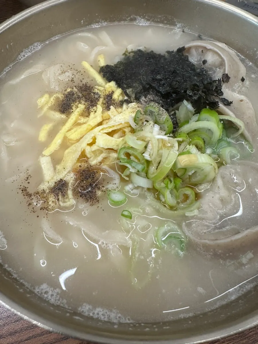 Cross-section of a dumpling packed with vegetables and meat