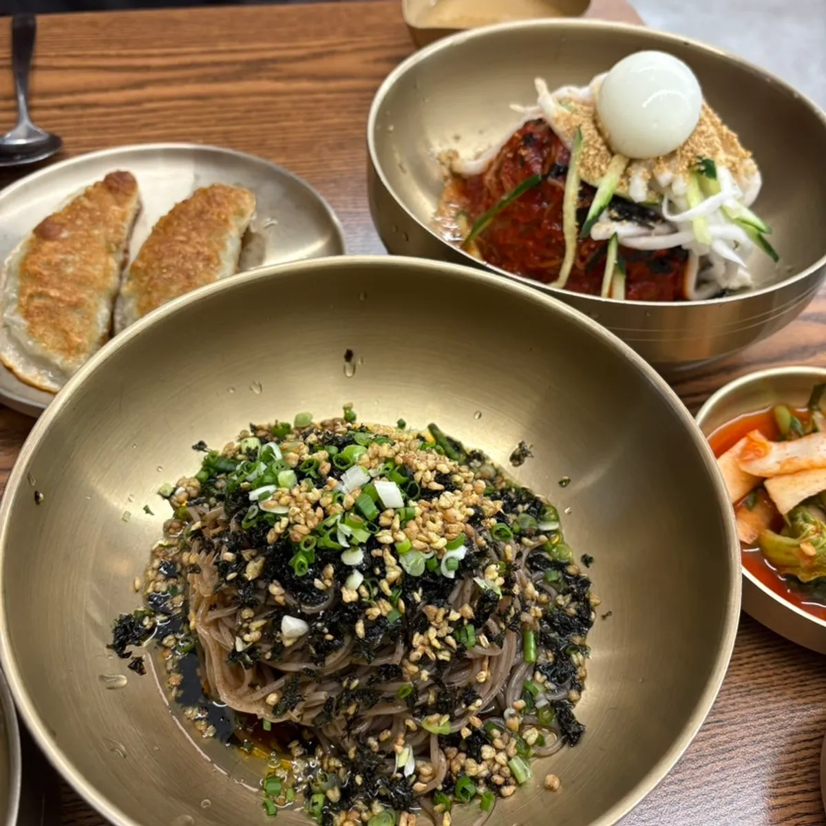 Table set with perilla oil makguksu and bibim makguksu