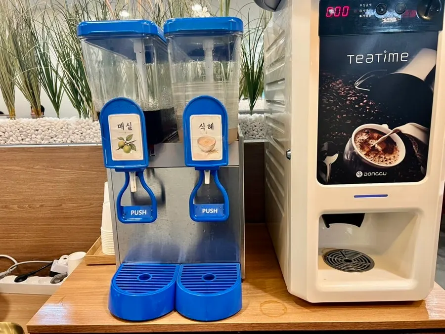 Dessert corner with corn tea, plum tea, and sikhye