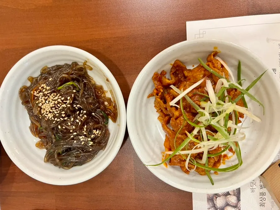Refilled japchae and stir-fried pork ordered via kiosk