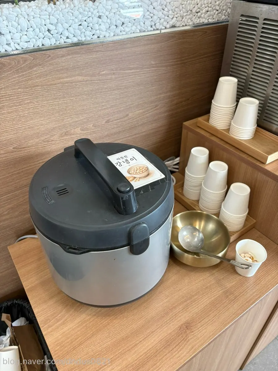 Self-serve bar with plum tea, sikhye, and coffee