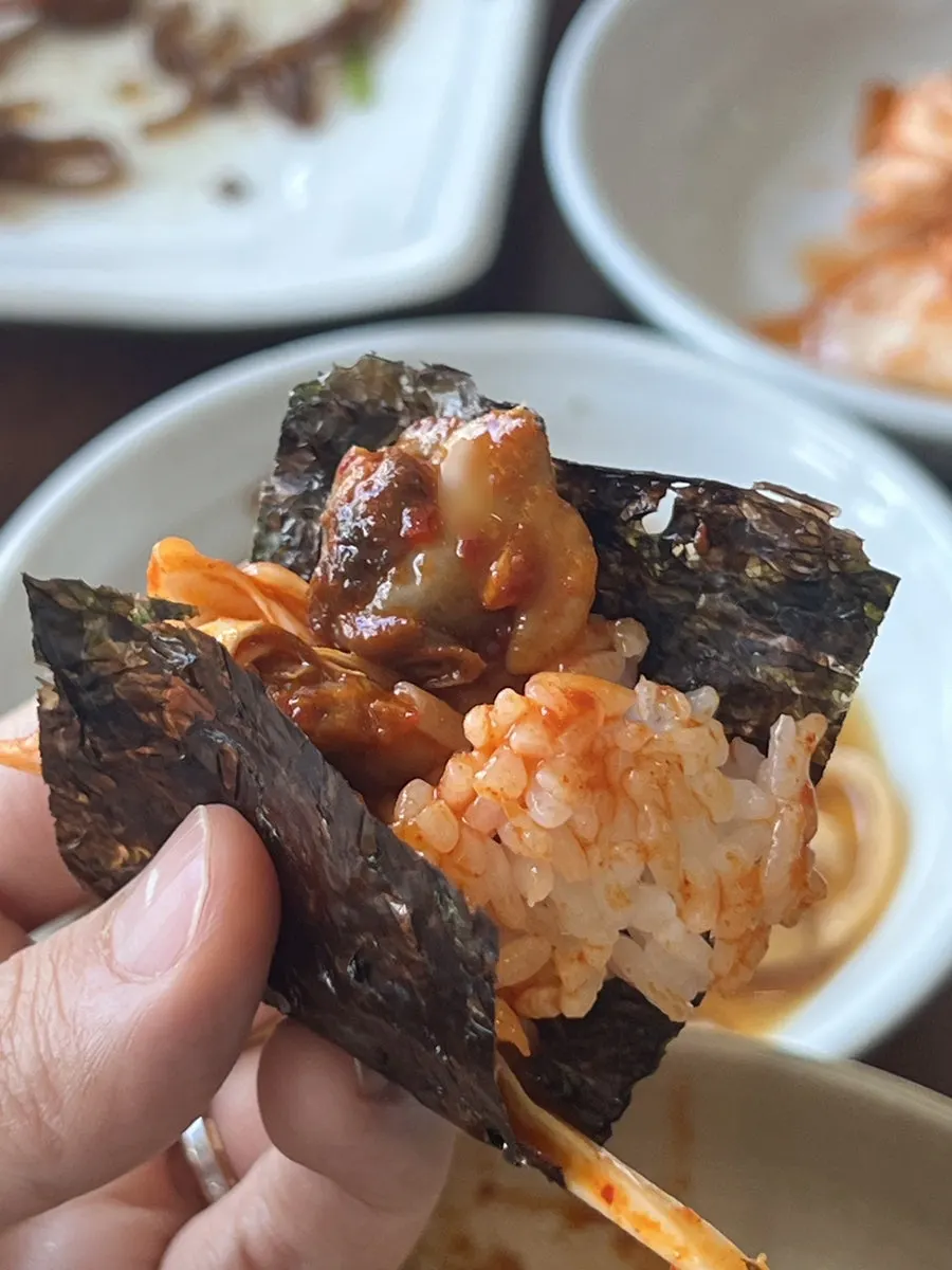 Seaweed soup and rice enjoyed with a child