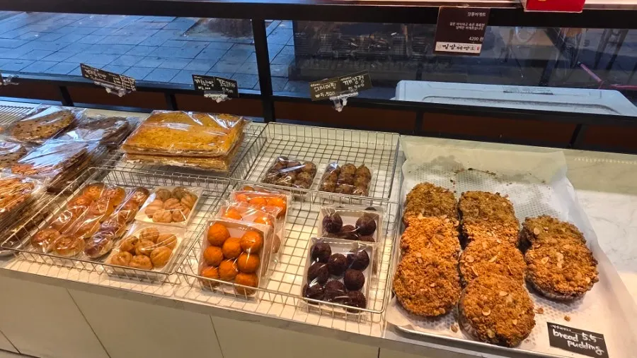 Wide view of the bread section at Milbat Bakery Pyeongchon