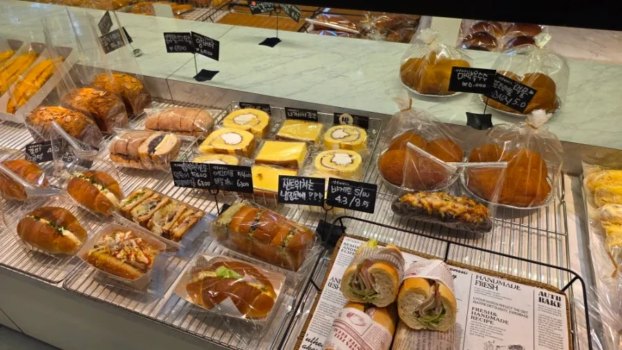 Freshly baked bread on display at Milbat Bakery Pyeongchon