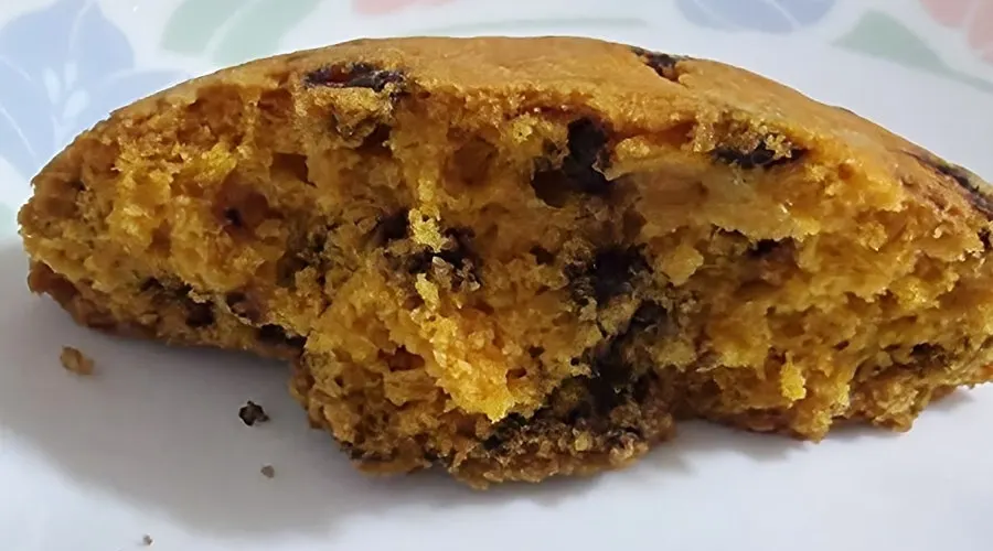 Cheddar cheese cookie drizzled with chocolate
