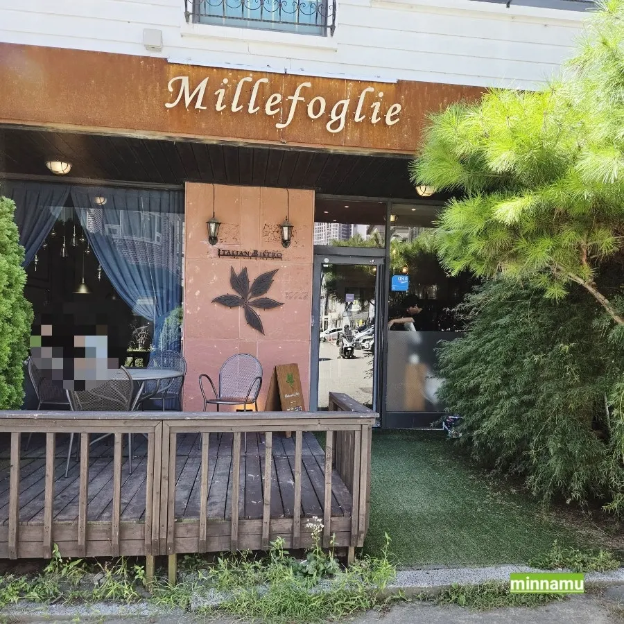 Millepollie's leafy green front entrance