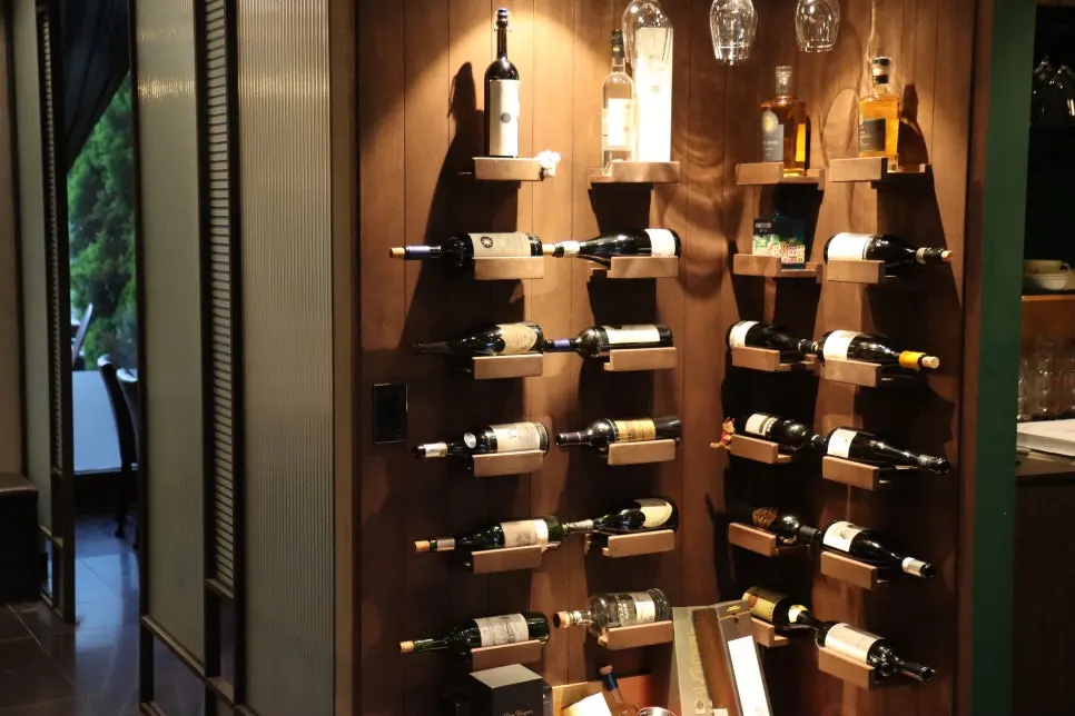 Wine bottles displayed on the wall