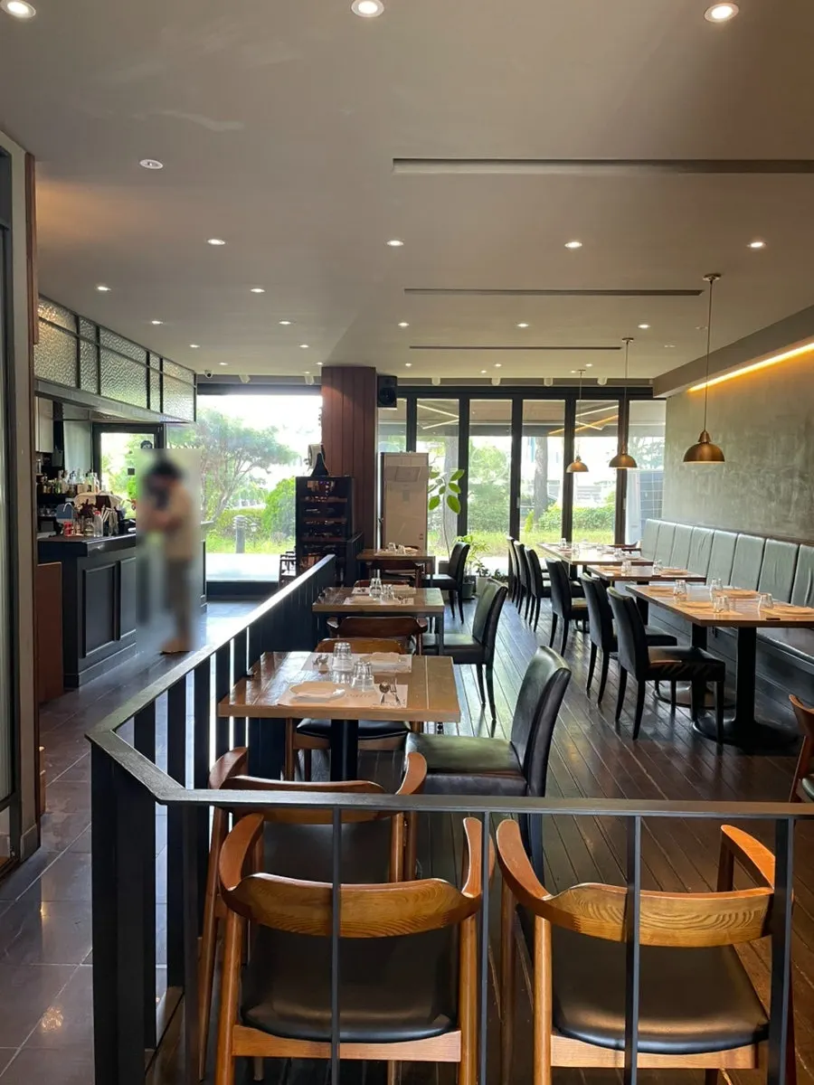Millepollie's calm-toned dining hall interior
