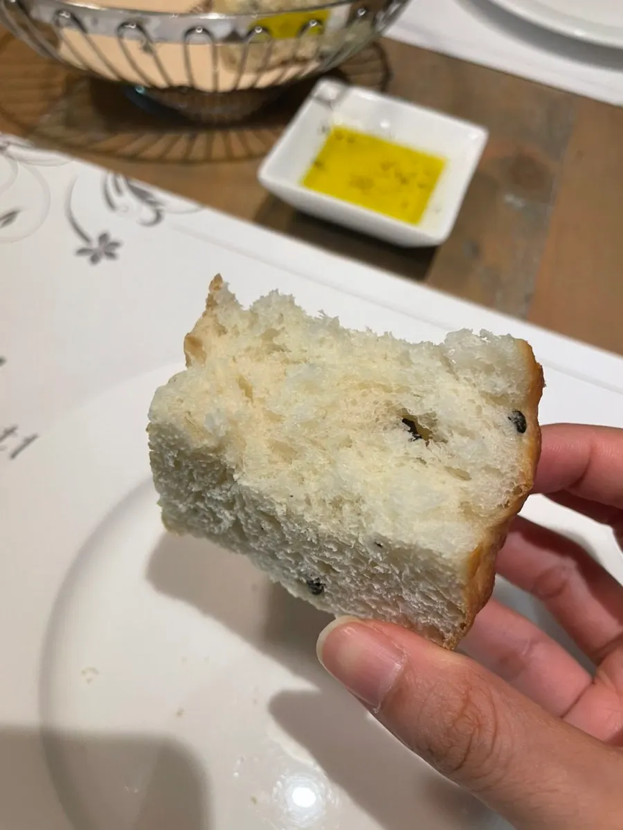 Close-up of the crispy-outside, soft-inside pre-meal bread