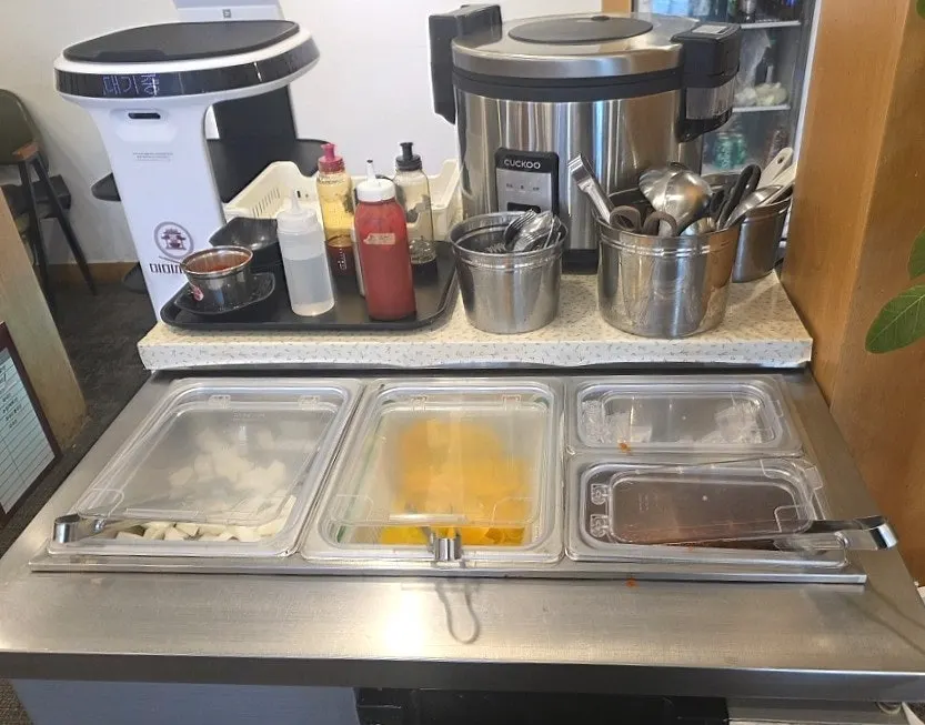 Self-serve bar where guests can refill side dishes