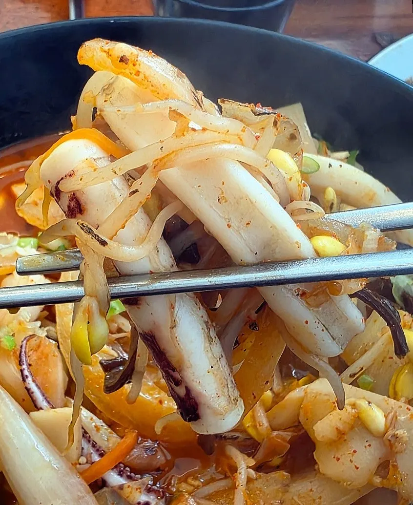 Squid and other seafood inside the jjamppong