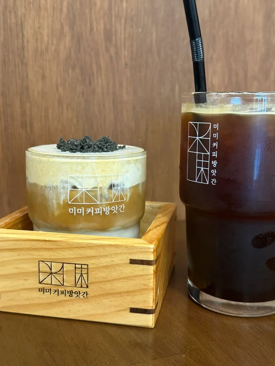 MIMI cream latte served in a wooden bowl