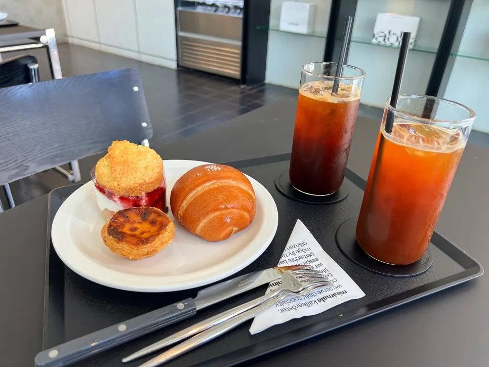Coffee and three types of baked goods on the table