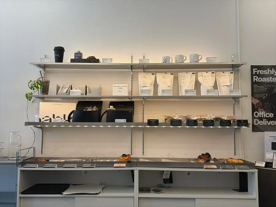 Bakery menu on display next to the counter