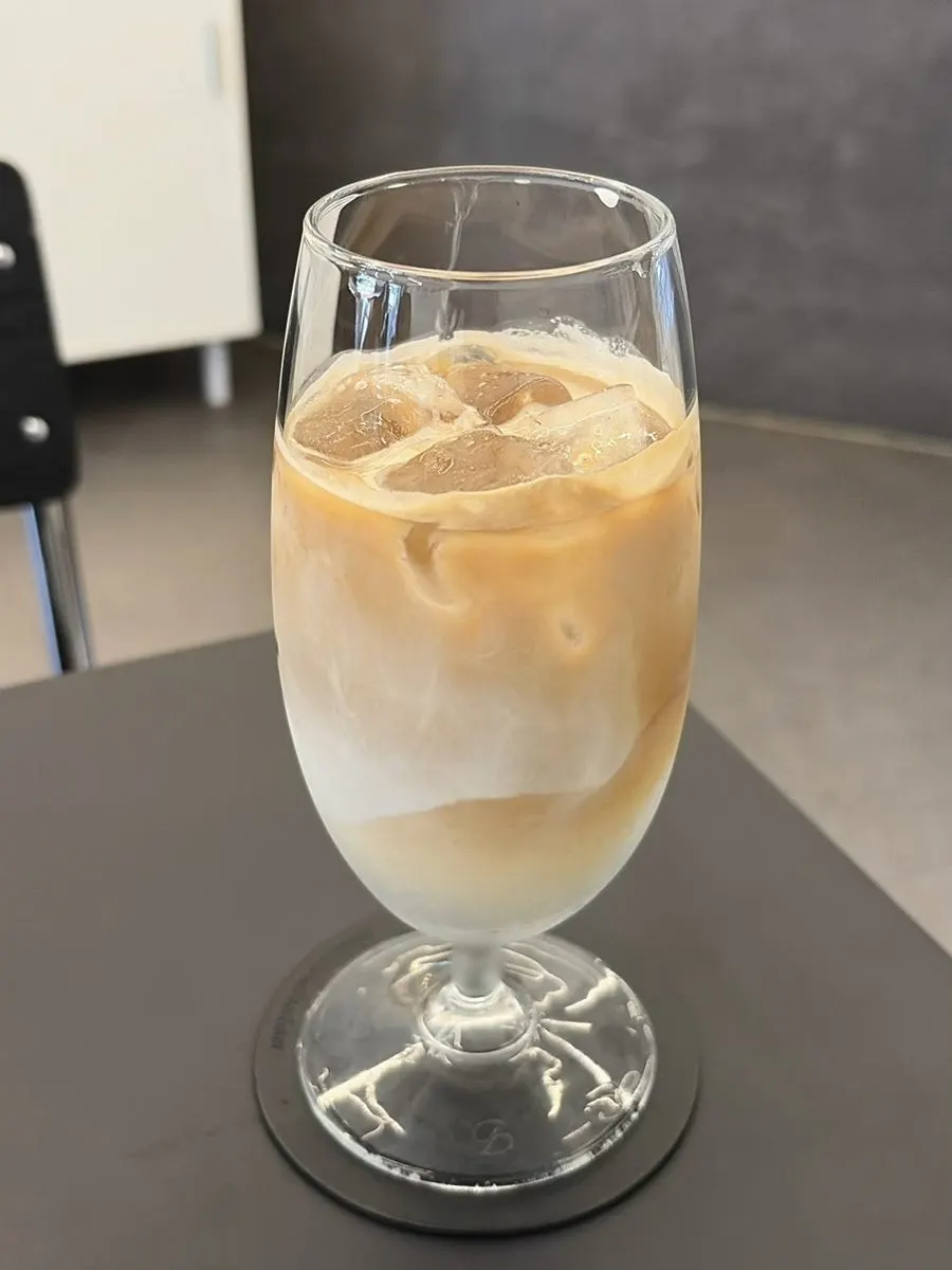 Vertical shot of the rich, milky Helsinki Latte