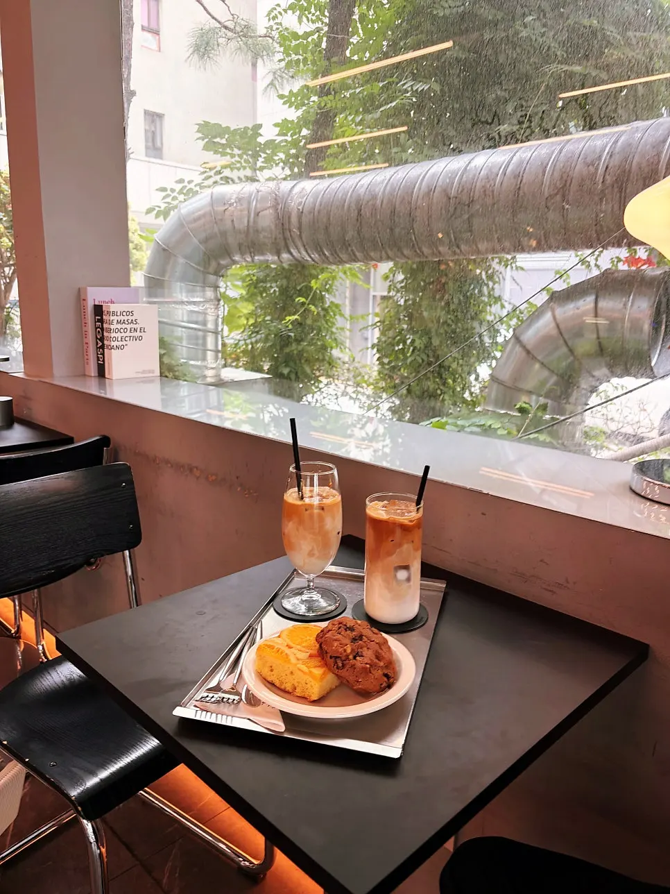 Helsinki latte served on a steel tray