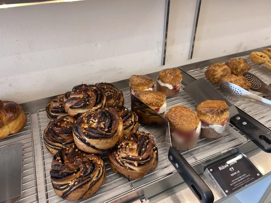 Counter with the Mini Male Coffee Roasters menu