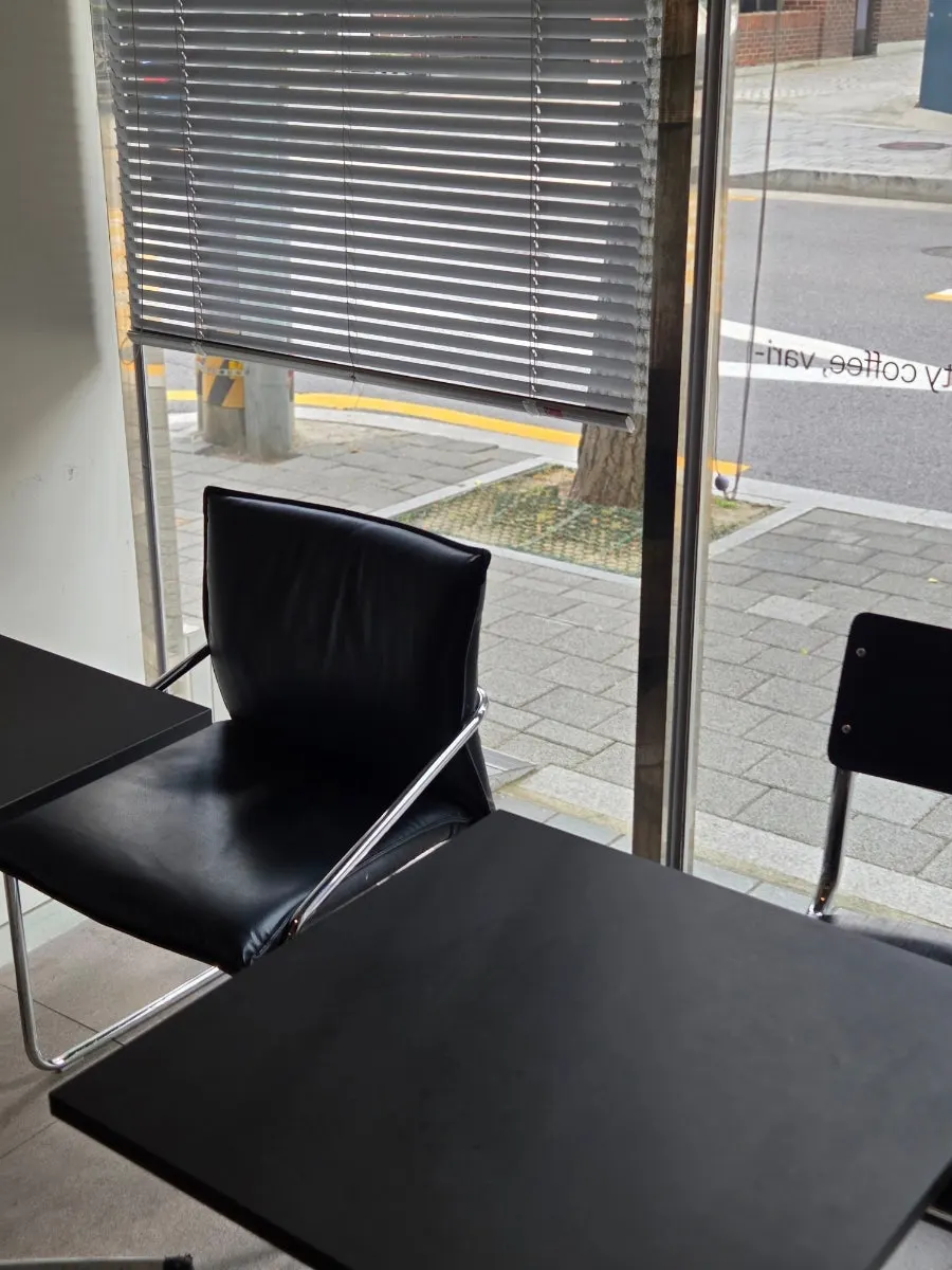 Seating area with spacious tables and comfortable chairs