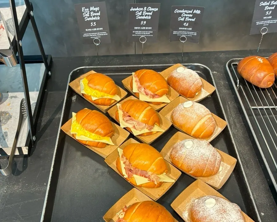 Close-up view of the bakery showcase at Minimale Gwacheon
